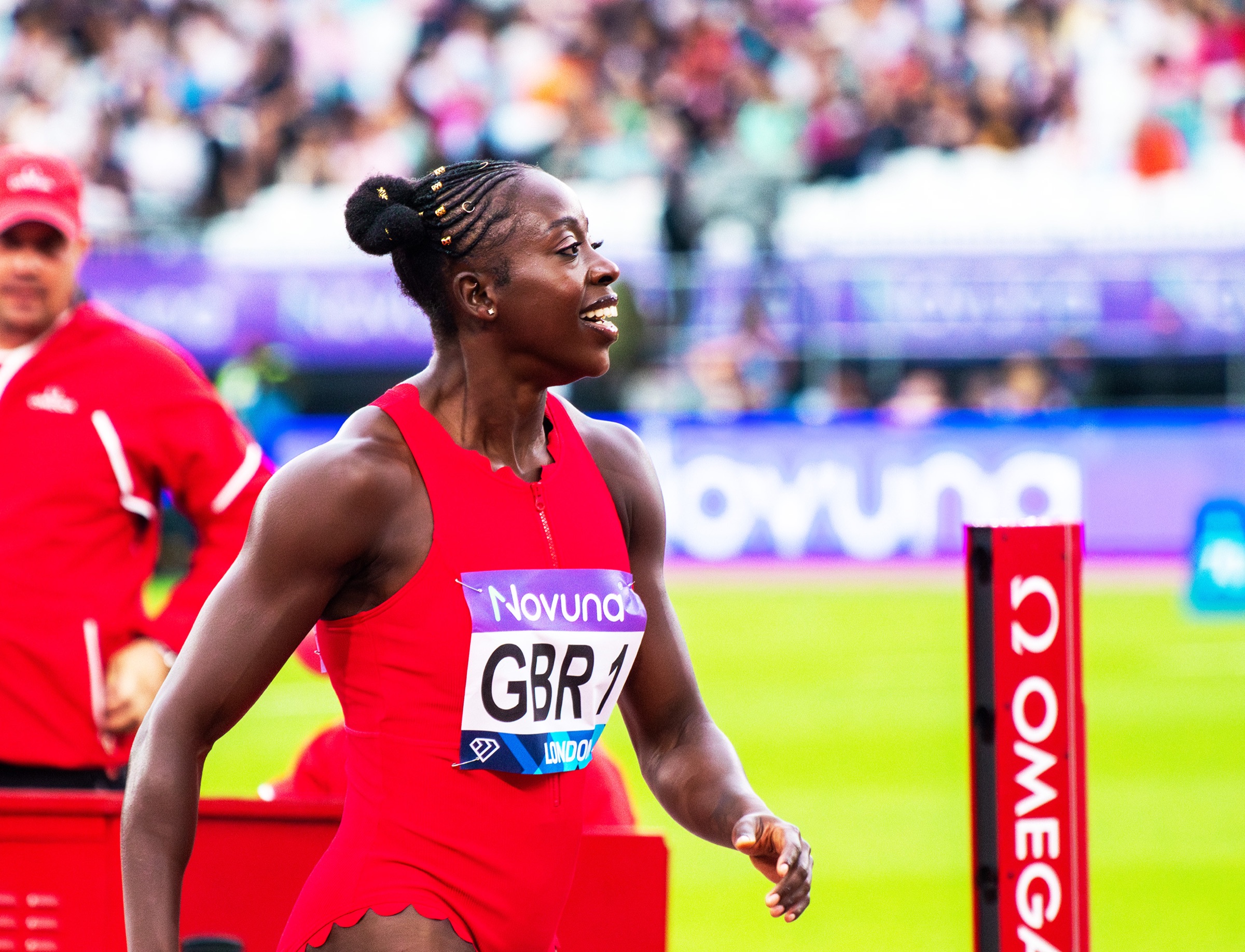 Team Great Britain women's 4x100m relay team crossing finish line at London Diamond League with world-leading time, Desiree Henry third leg